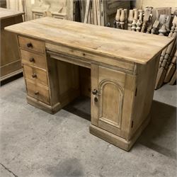 Victorian pine twin pedestal desk, rectangular to over four drawers, central shallow drawer and panelled cupboard, the removable top reveals hidden storage compartments, on skirted base - THIS LOT IS TO BE COLLECTED BY APPOINTMENT FROM THE OLD BUFFER DEPOT, MELBOURNE PLACE, SOWERBY, THIRSK, YO7 1QY