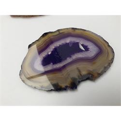 Three purple agate slices, polished with rough edges, of various sizes largest H7cm, L10cm