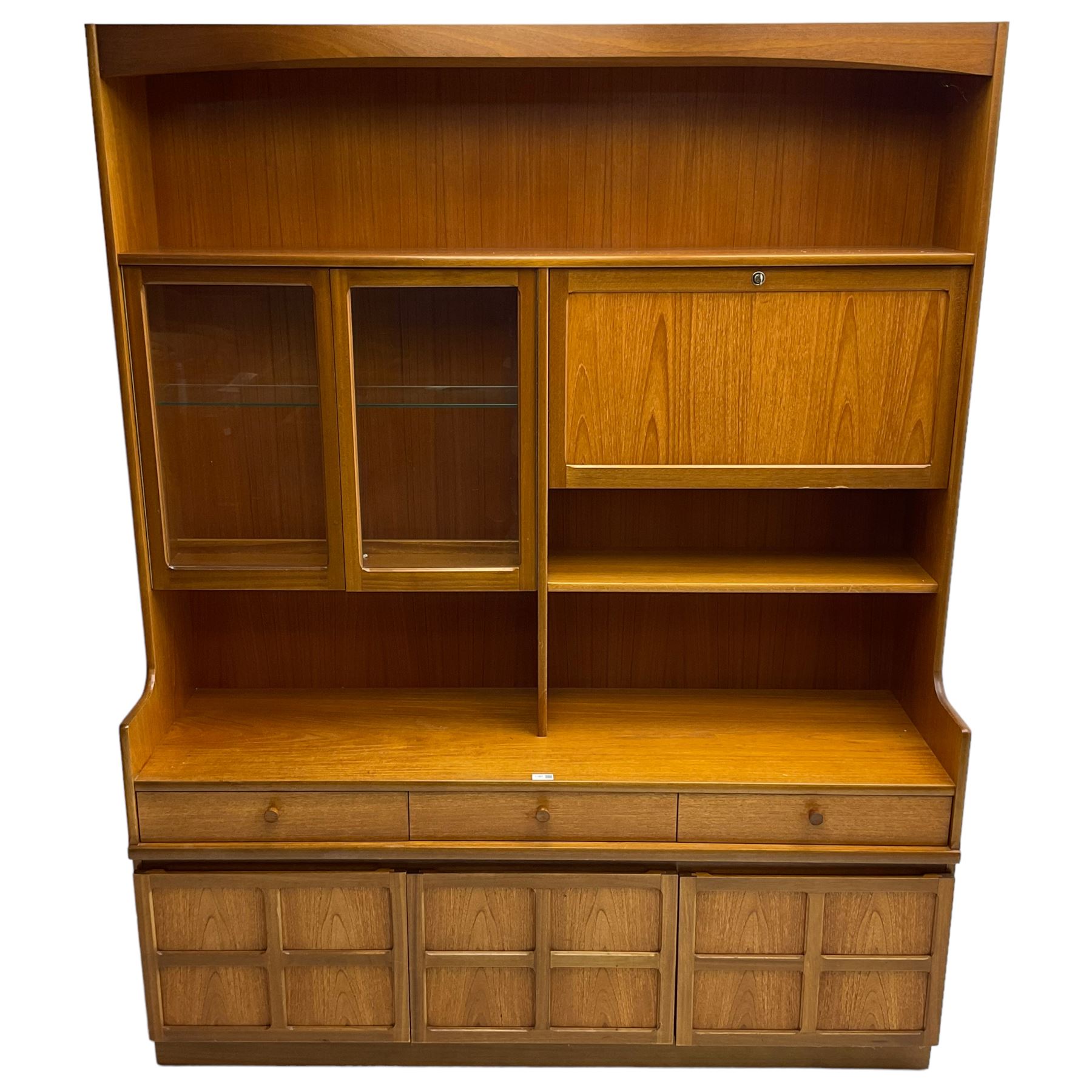 Nathan - teak wall unit, fitted with raised display cabinet and fall front compartment, three drawers and three cupboards below