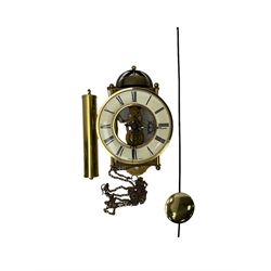 A 20th century cuckoo clock and weight driven German wall clock.