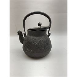 Chinese cast iron teapot, of bulbous form with ring handle, zoomorphic spout and low relief stylised decoration to body, not including handle H14cm