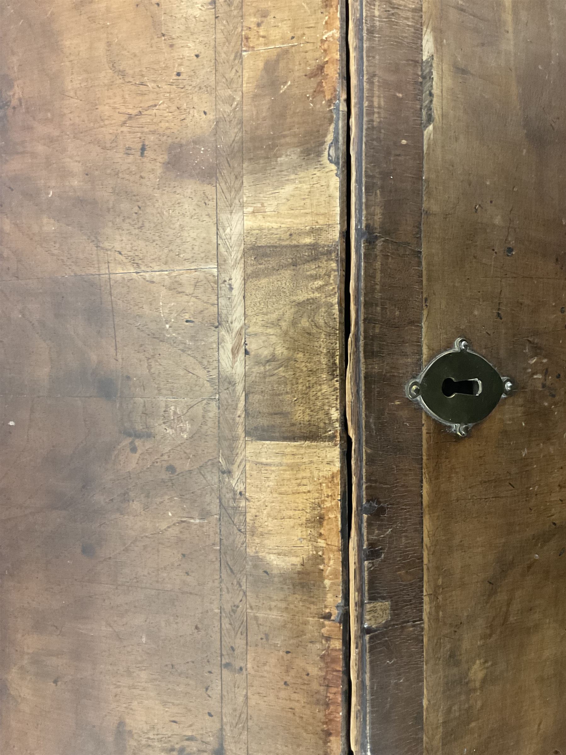 18th century walnut bureau, crossbanded and feather-banded rectangular top and fall-front, enclosing fitted interior with pigeonholes and correspondence drawers with bone handles, over two short and three long graduating drawers with moulded facias and original brass handles, on bracket feet