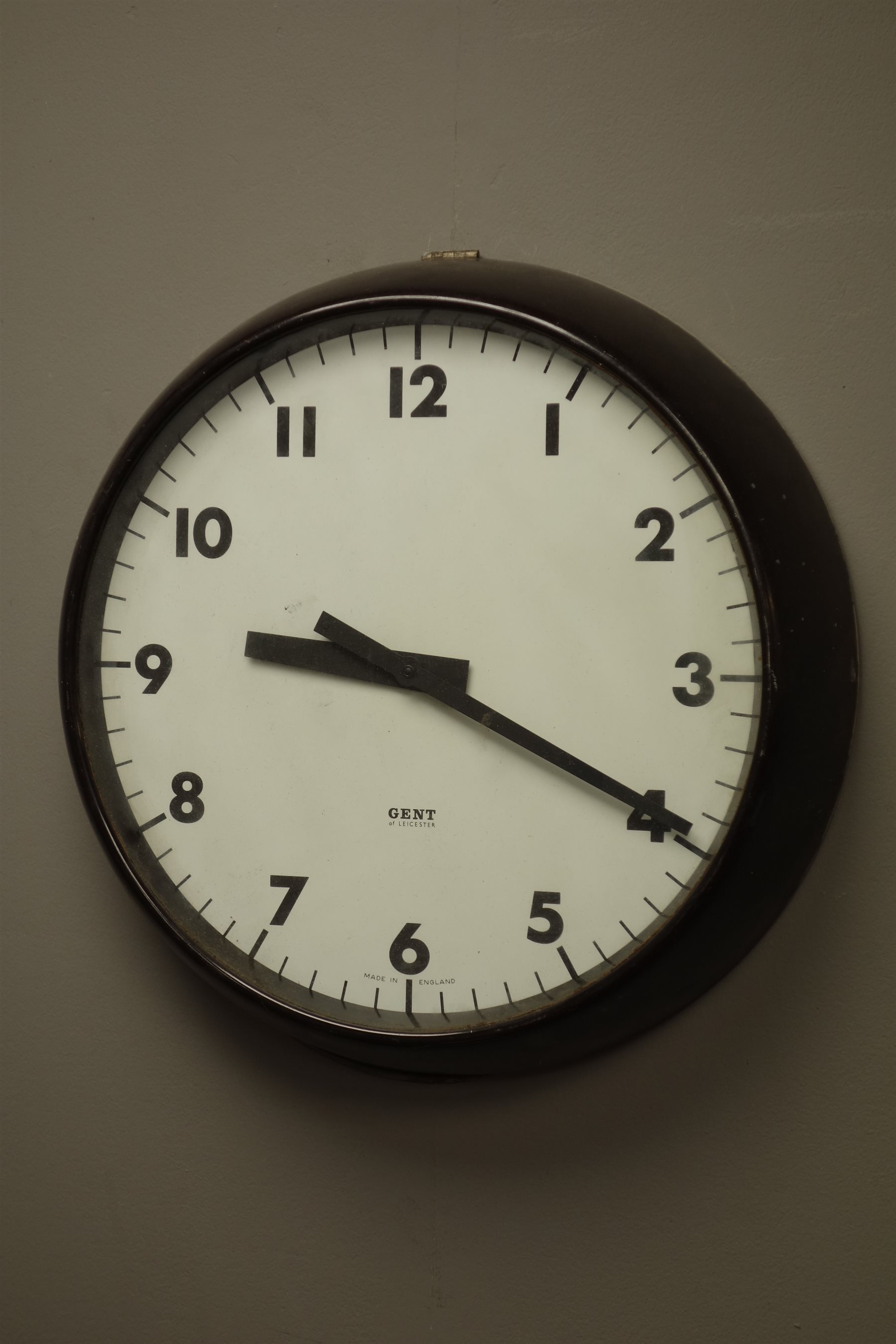 Four 1940s Gents Of Leicester Electric Slave Wall Clocks With Two White Two Silvered Arabic Dials In Bakelite Cases