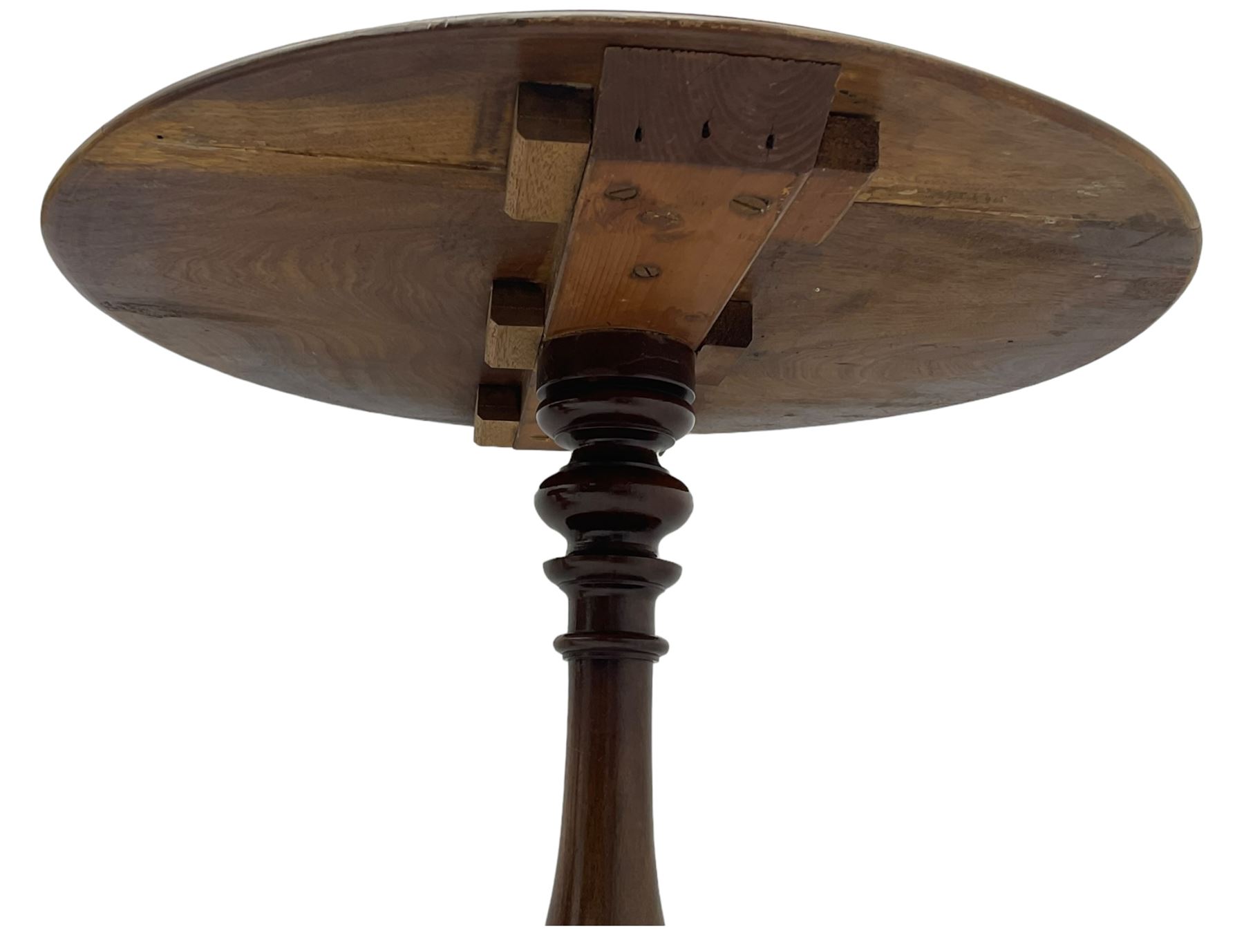 Mid-19th century mahogany tripod table, moulded circular top on vasiform pedestal with three carved out-splayed supports 