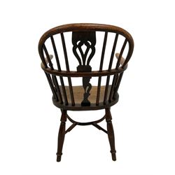 19th century yew wood and elm Windsor chair, low hoop stick back with pierced splat, dished seat raised on ring turned supports joined by crinoline stretcher