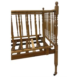 Victorian beech and pitch pine crib, turned spindle gallery supports, raised on square tapering supports with castors