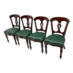 Matched set of twelve Victorian mahogany dining or boardroom chairs, the shaped cresting rail decorated with scrolled decoration, upholstered drop-on seats upholstered in green fabric, on turned supports  