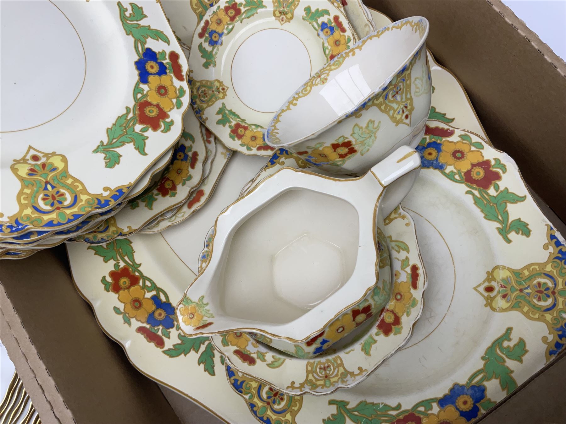 Minton Marlow pattern tea and dinner wares, including dinner plates, side plates, tea cups, cake plate, etc together with Bishops & Stonier 'Bisto' green and gilt tea wares and Maddock Ivory Ware dinner wares, in three boxes