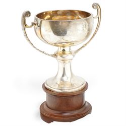 'The Harry Preston Memorial Challenge Cup 1929' - A two handled cup on pedestal base and w...