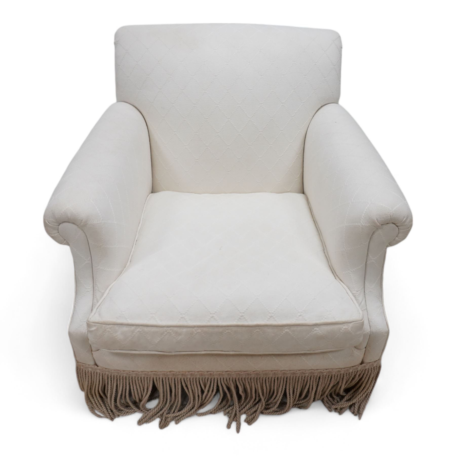 Late 20th century hardwood-framed armchair, rolled back and arms upholstered in cream fabric with fringe, on square front feet 