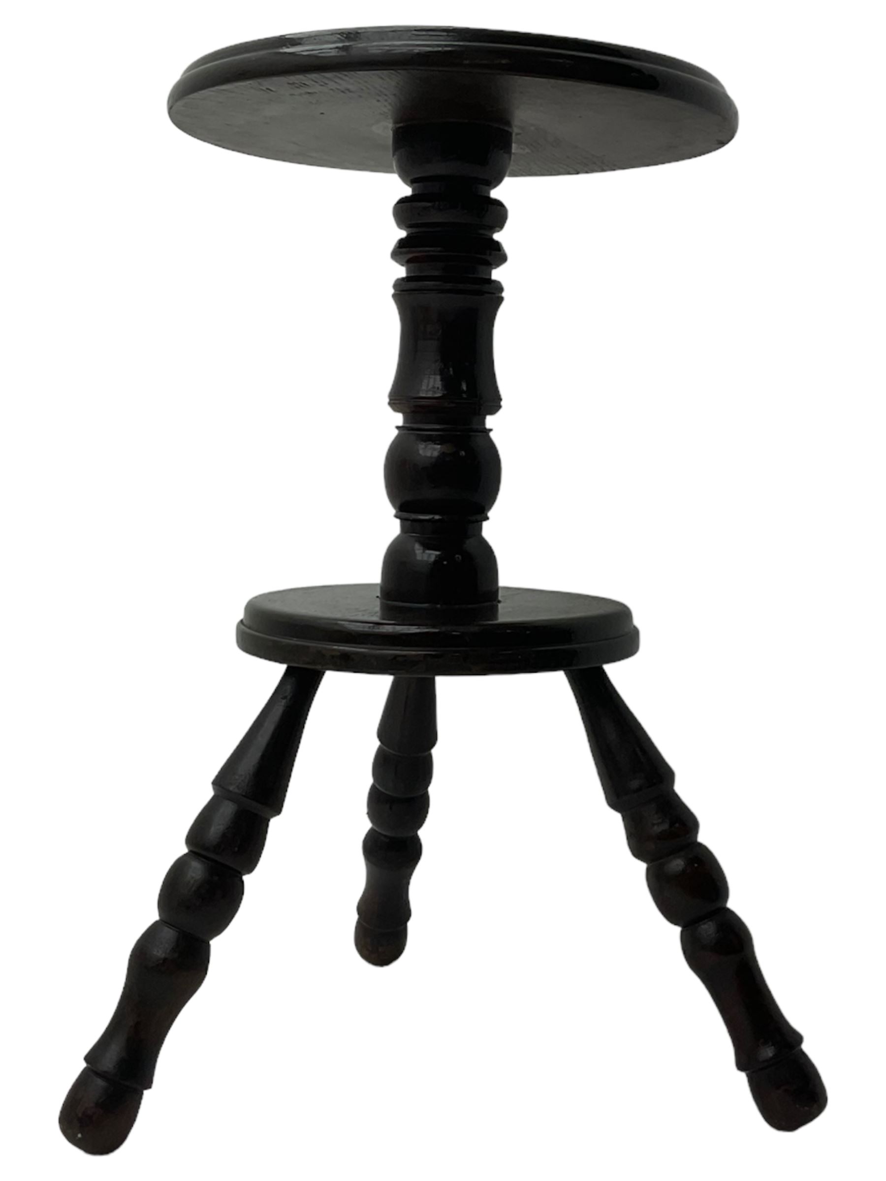 20th century 'primitive' design three-legged cricket table, circular moulded top on turned pedestal, circular moulded low platform over three turned and splayed supports 