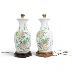  Pair of large 20th century Oriental design table lamps decorated with spray of flowers on wooden bases H50cm excluding fitting 