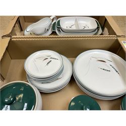 Denby part dinner service, decorated in the Greenwheat pattern, comprising dinner plates, dessert plates, side plates, lidded tureen, pair of smaller lidded dishes, sauce boat, and various serving dishes, in two boxes