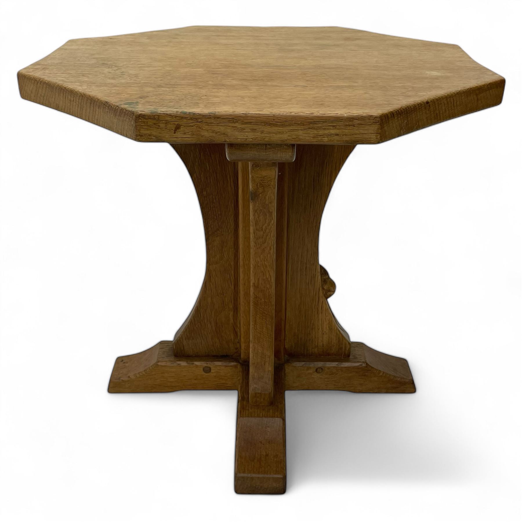 Mouseman - oak occasional table, octagonal adzed top, cruciform pedestal on sledge feet, carved with mouse signature, by the workshop of Robert Thompson, Kilburn 