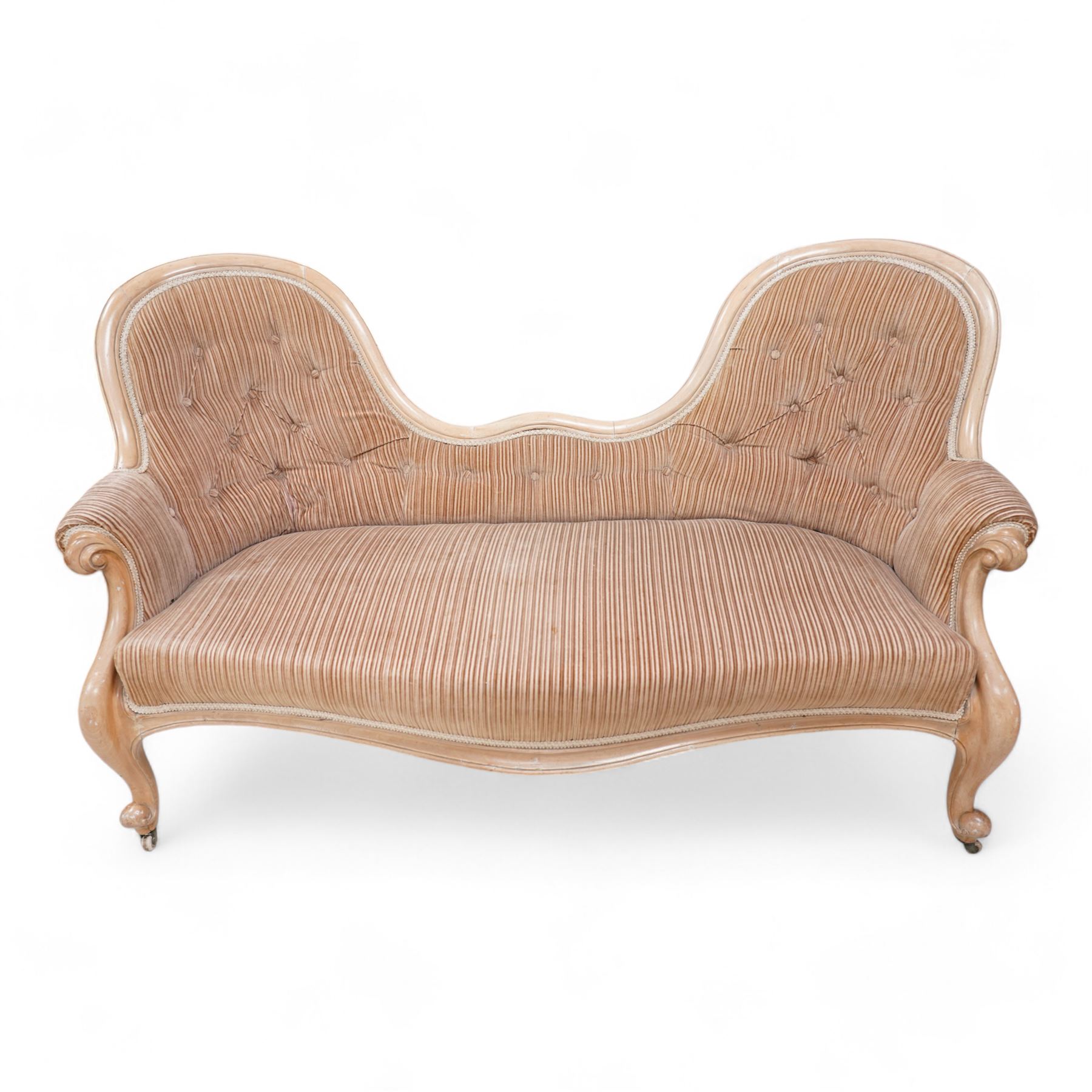 Victorian walnut framed double-ended two-seat settee, upholstered in buttoned striped fabric, on shaped and scroll carved cabriole supports with castors 