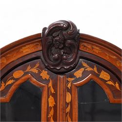 18th century Dutch marquetry walnut and gilt metal mounted vitrine cabinet on chest, shaped pediment carved with scrolling foliage cartouche, inlaid with trailing leafy branches and flower heads, two internal shelves enclosed by two glazed doors, the lower section with bombe outline fitted with three drawers, with ornate cast gilt metal edging and terminal caps