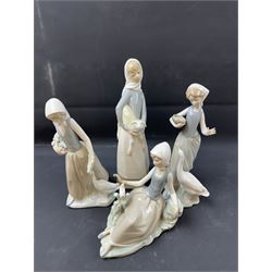 Four Lladro figures, including Girl with Lamb, Girl with Dove etc