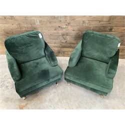 Pair of Howard design armchairs, upholstered in jade green velvet fabric