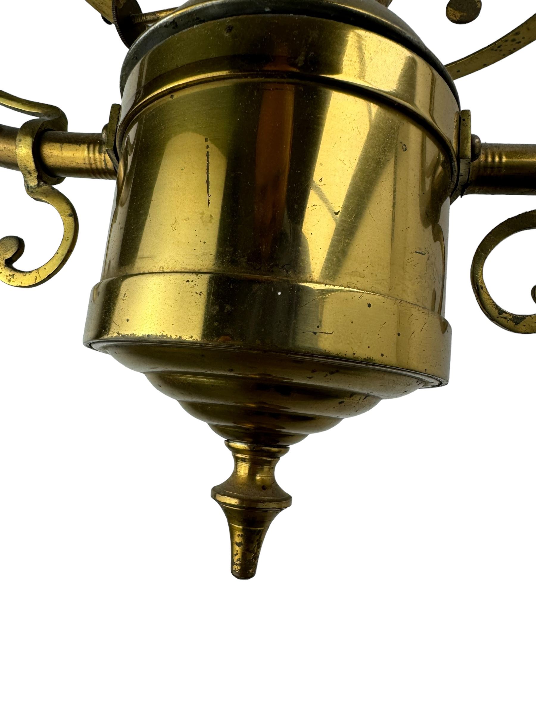 Set three brass framed light fittings, one with white glass shade, converted to electricity, H64cm