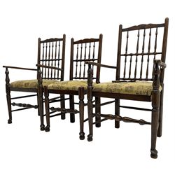 Set of six (4+2) 20th century oak spindle back dining chairs, with upholstered drop-on seat cushions, turned supports joined by turned stretchers