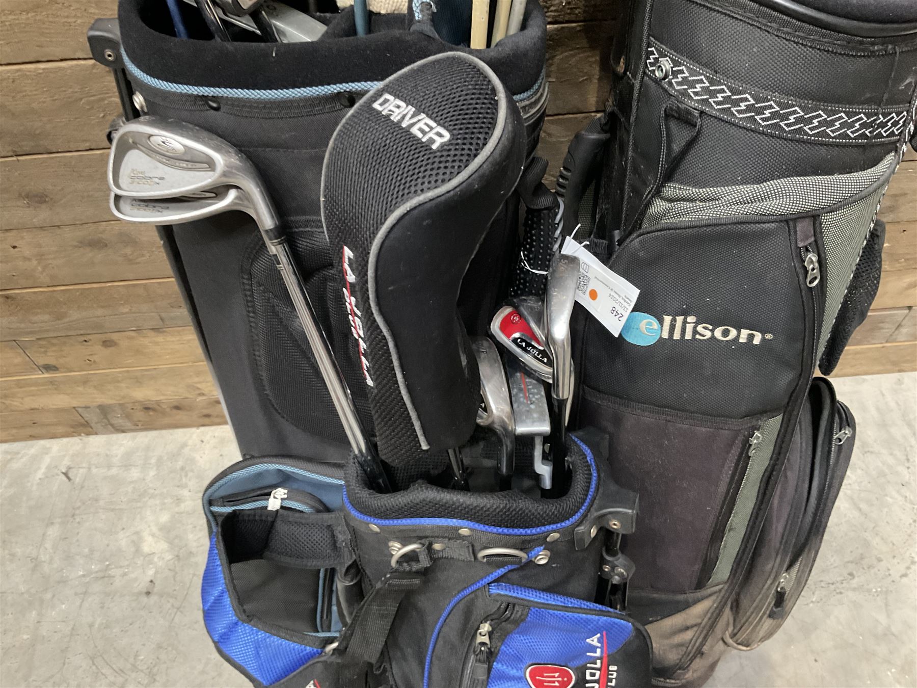 Battlesticks and other golf clubs in three bags