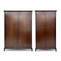 Stag Minstrel - pair of mahogany double wardrobes, comprising a larger wardrobe with a she...