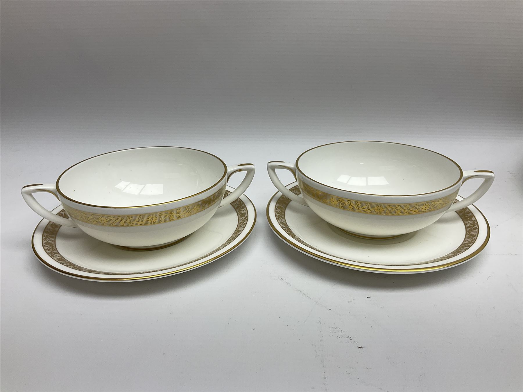 Royal Worcester Golden Anniversary pattern dinner wares, including ten dinner plates, twelve side plates, eight twin handled bowls and saucers, covered tureen (55)