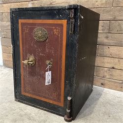 Samuel Withers & Co of West Bromwich - Victorian cast iron safe, the brass handle modelled...