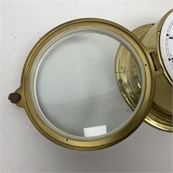 German Schatz Royal Mariner bulkhead ships clock, with an eight-day two-train platform seven-jewel movement, striking the ship's watch on a bell, with bells on/off facility and platform regulation on the 5 inch painted dial, with roman numerals and minute track, in brass case, case D16cm