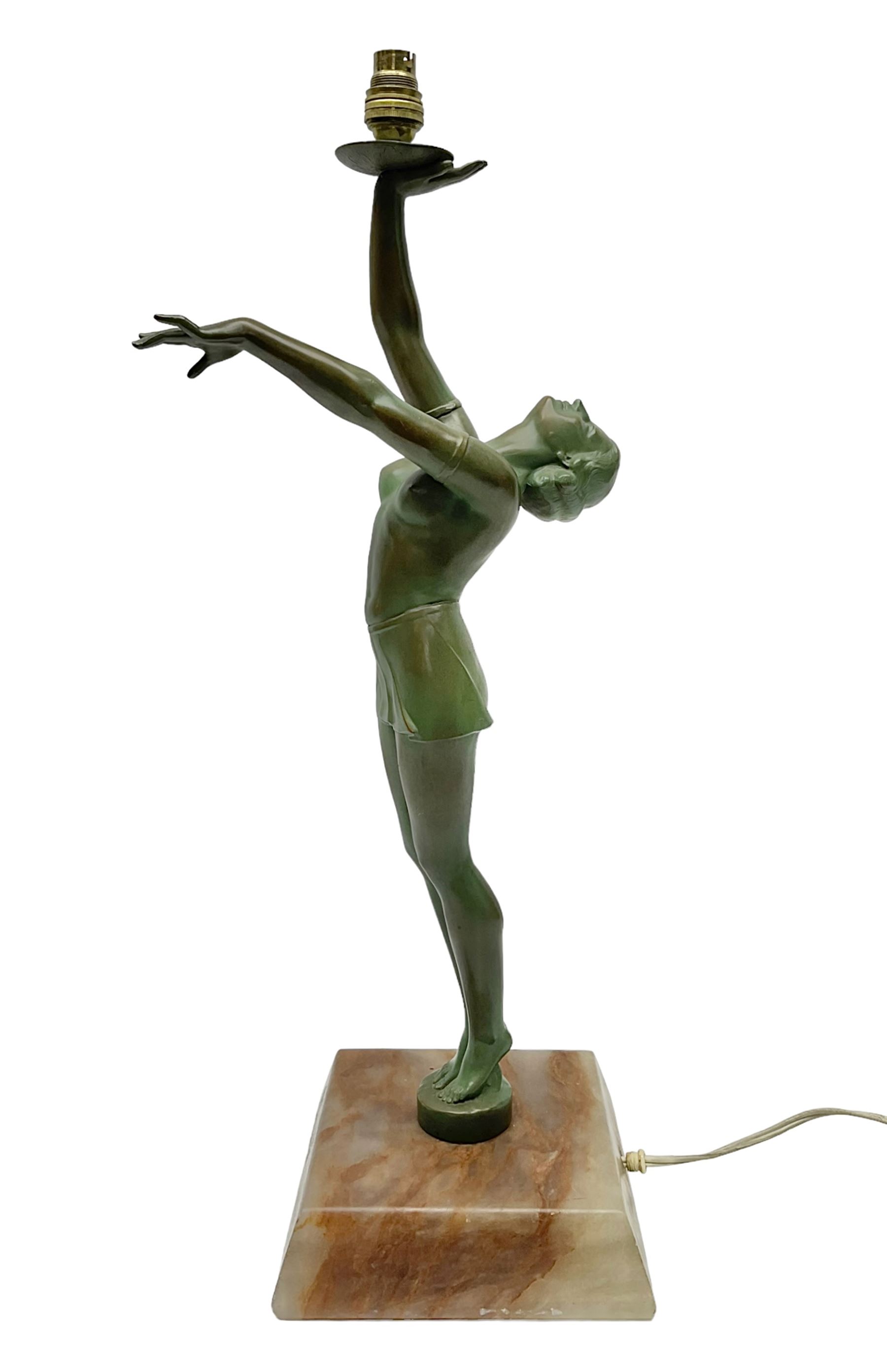 Art Deco patinated spelter table lamp, modelled as a young woman, upon a canted square alabaster plinth, H49.5cm