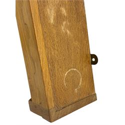 Rabbitman - oak wall hanging plate rack, moulded cresting rail over two shelves, shaped end supports, carved with rabbit signature, by Peter Heap, Wetwang