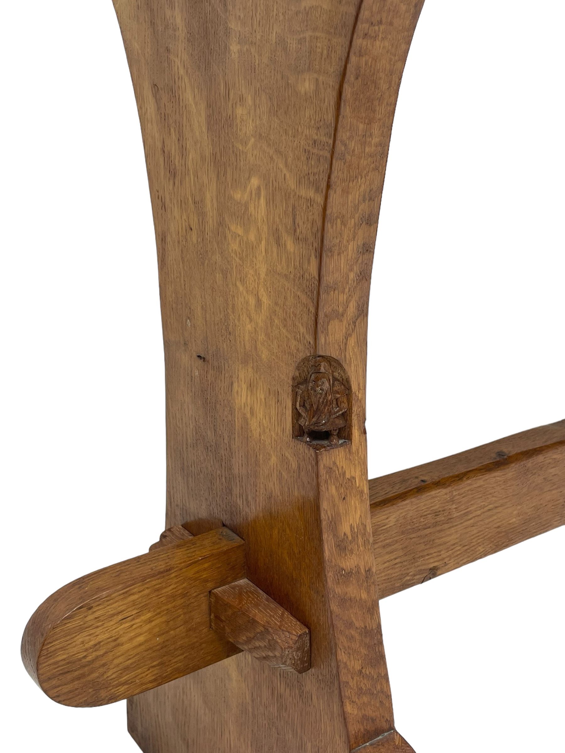 Gnomeman - oak side table, rectangular adzed top over two drawers, on shaped end end supports united by pegged stretcher, carved with gnome signature, by Thomas Whittaker, Littlebeck 