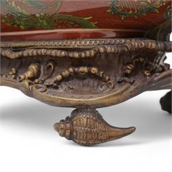 Pair of Continental ceramic and patinated metal table centre pieces, possibly by Castilian, each of boat form with pierced and polychrome decoration, with swan and shell moulded supports, H31cm x L46cm