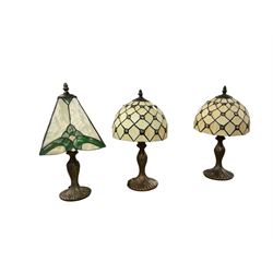 Pair of Tiffany style table lamps, together with one other, largest H40cm 