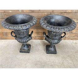 Pair of Victorian design ornate black painted cast iron garden urns, egg and dart rim, tapering column on pedestal base H63, D48