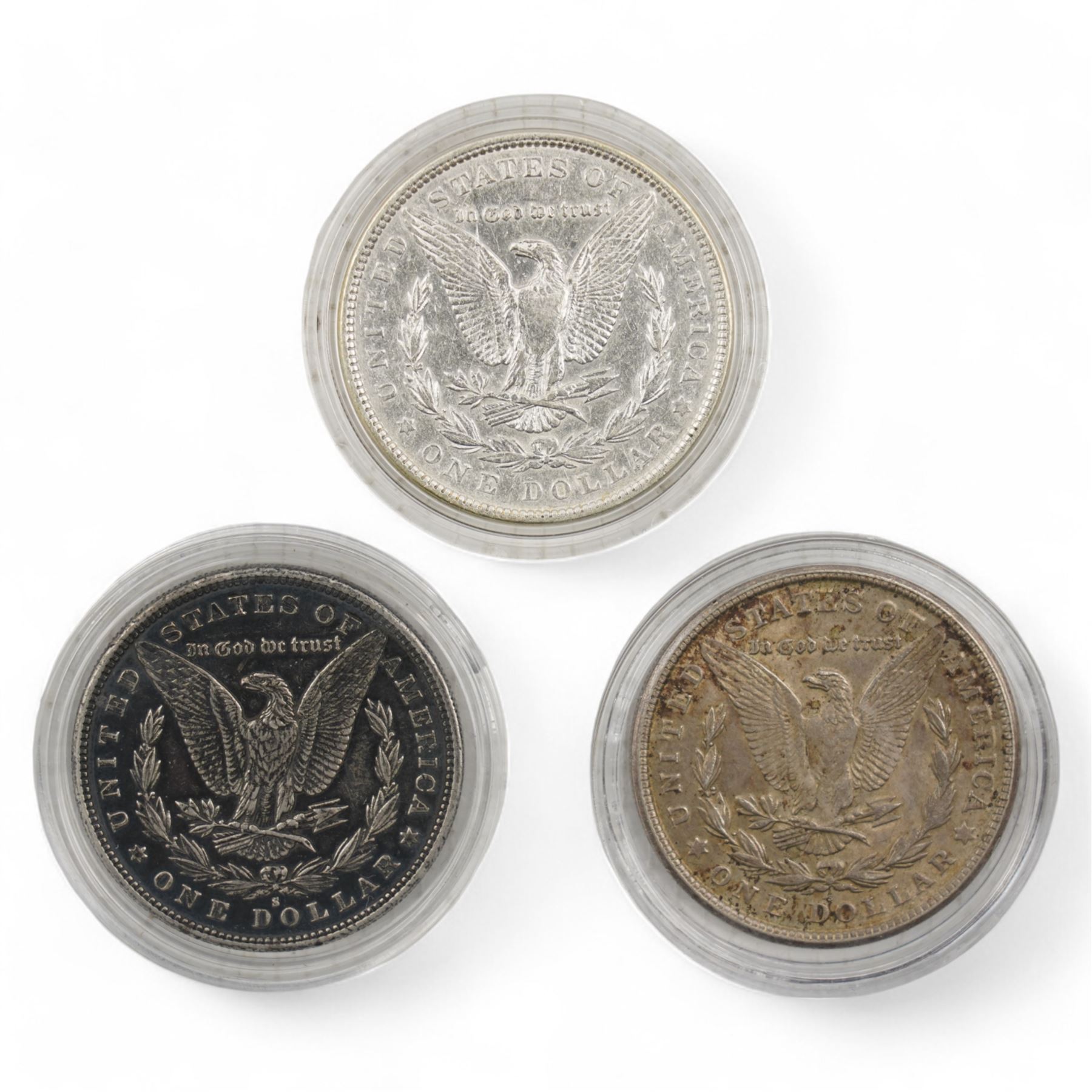 Three United States of America silver Morgan dollar coins, dated 1879S, 1887 and 1921S