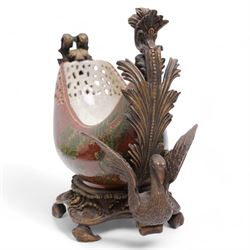 Pair of Continental ceramic and patinated metal table centre pieces, possibly by Castilian, each of boat form with pierced and polychrome decoration, with swan and shell moulded supports, H31cm x L46cm