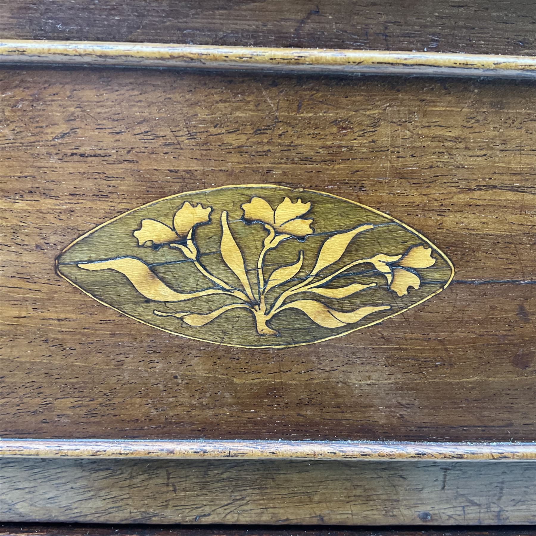 Early 19th century mahogany chest, three shallow frieze drawers over two short and three long cock-beaded drawers, canted corners with reeded moulded square columns, on ogee bracket feet