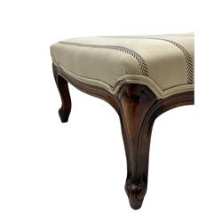 Pair of French design stained beech footstools, shaped form upholstered in pale fabric with herringbone stripe, on cabriole feet with scroll carved terminals 