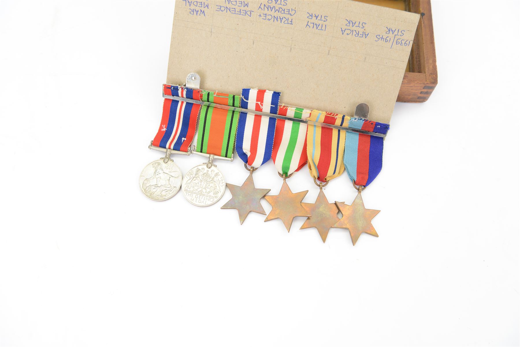 WWII group of six medals comprising 1939-45 War Medal, Defence Medal, 1939-45 Star, Africa Star, France and Germany Star and Italy on wearing bar