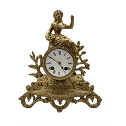 French - late 19th century 8-day mantle clock, in a spelter case with a solitary maiden seated above the drum movement, with an enamel dial, Roman numerals, minute markers and spade hands, twin train countwheel striking movement striking the hours and half hours on a bell. With pendulum and key. 