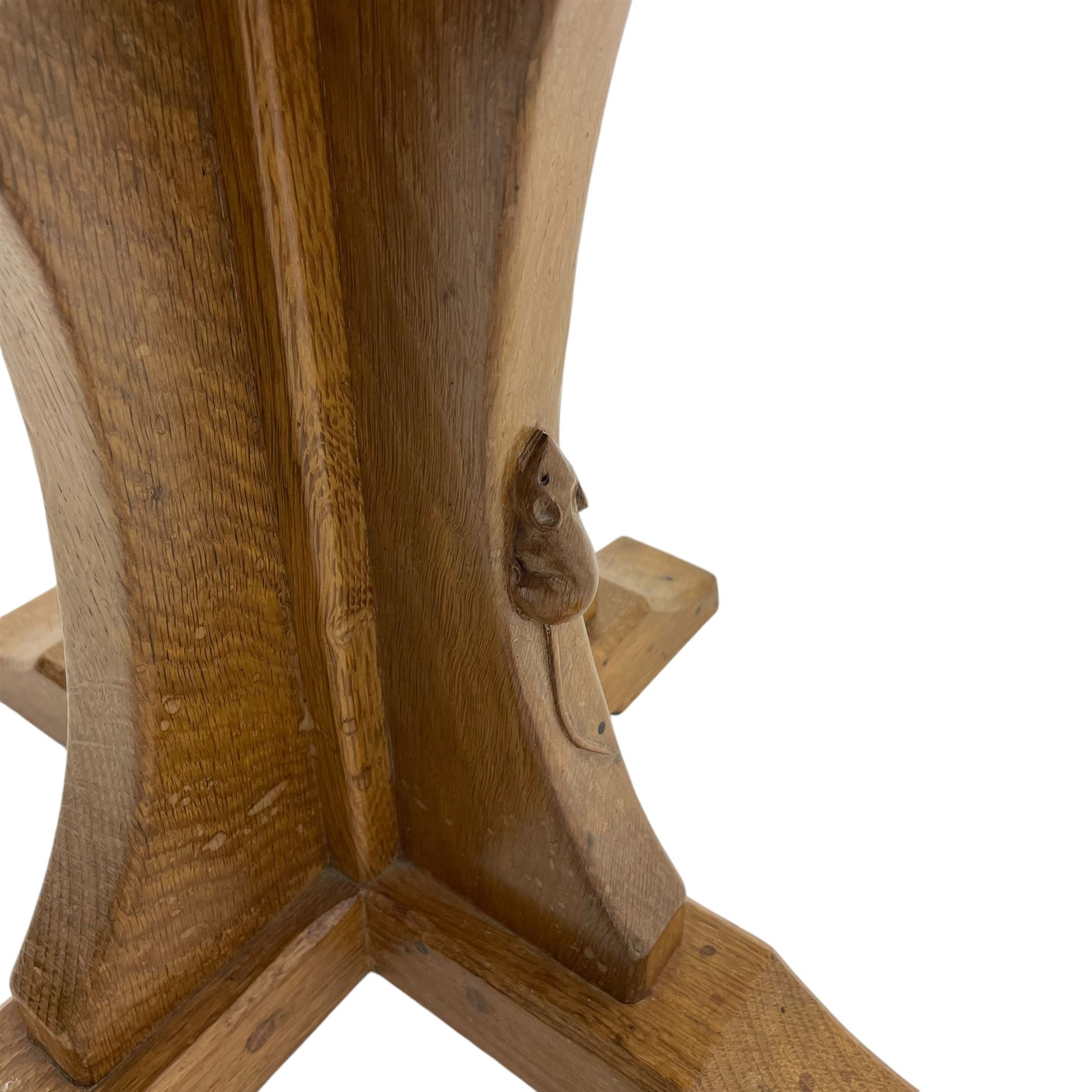 Mouseman - occasional table, adzed octagonal top, cruciform base on sledge feet, carved with mouse signature, by the workshop of Robert Thompson, Kilburn 