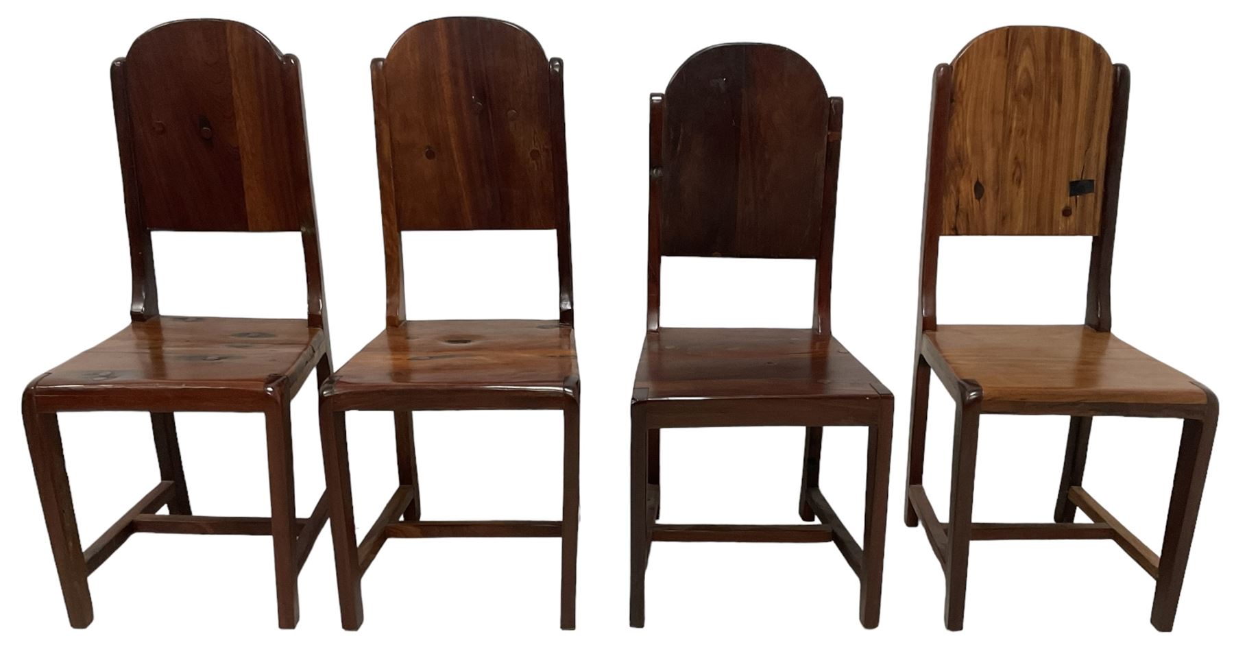 Mid-to-late 20th century teak dining table, rectangular top with canted corners, on square tapering supports with spade feet (214cm x 119cm, H76cm); and a set of eight Burmese reclaimed teak dining chairs, high arched back over panelled seat