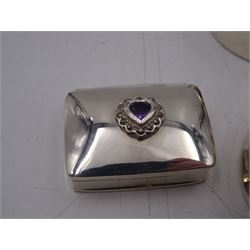 Four silver boxes, comprising oval example embossed with horse and rider, a rectangular example set with heart shaped amethyst, an oval example with set with carved abalone shell portrait, and a circular example set with Victorian penny, all hallmarked 