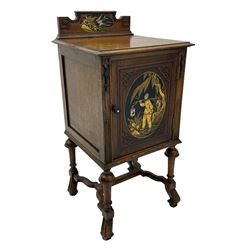 Early 20th century circa. 1920s oak bedside cupboard, raised back decorated with chinoiserie lacquer work depicting bird and flowers, moulded top over single door decorated with figure carrying bird cages, on turned supports united by shaped moulded stretchers, scroll carved feet