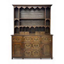 Early 20th century oak dresser, projecting cornice above dentil moulding and a scalloped f...