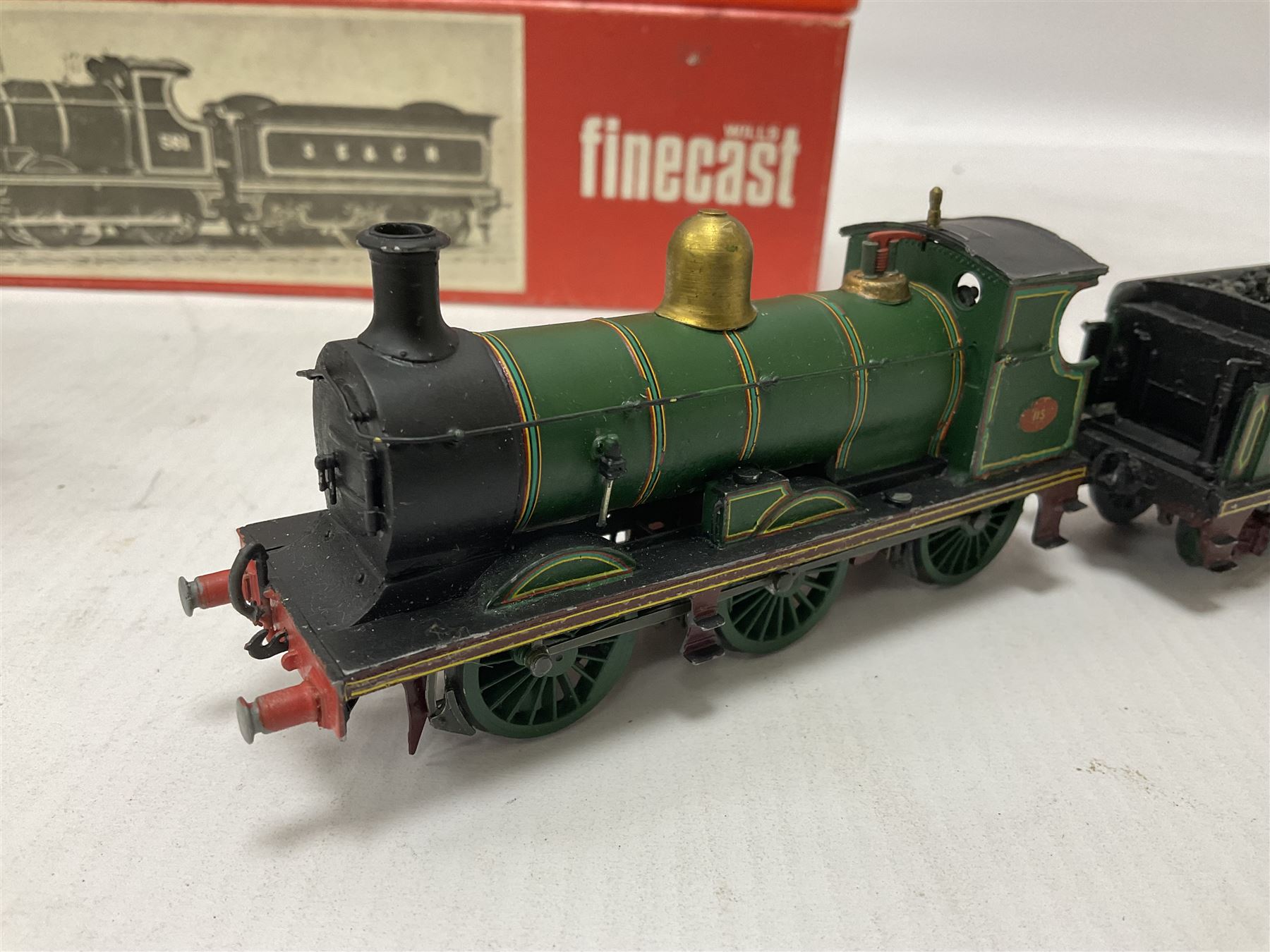 ‘00’ gauge - two kit built locomotive and tenders comprising SR Wainwright Class C 4-4-0 no.115 finished in SE&CR green; SR Wainwright Class D 4-4-0 no.31750 finished in BR black; both with Wills Finecast boxes (2) 