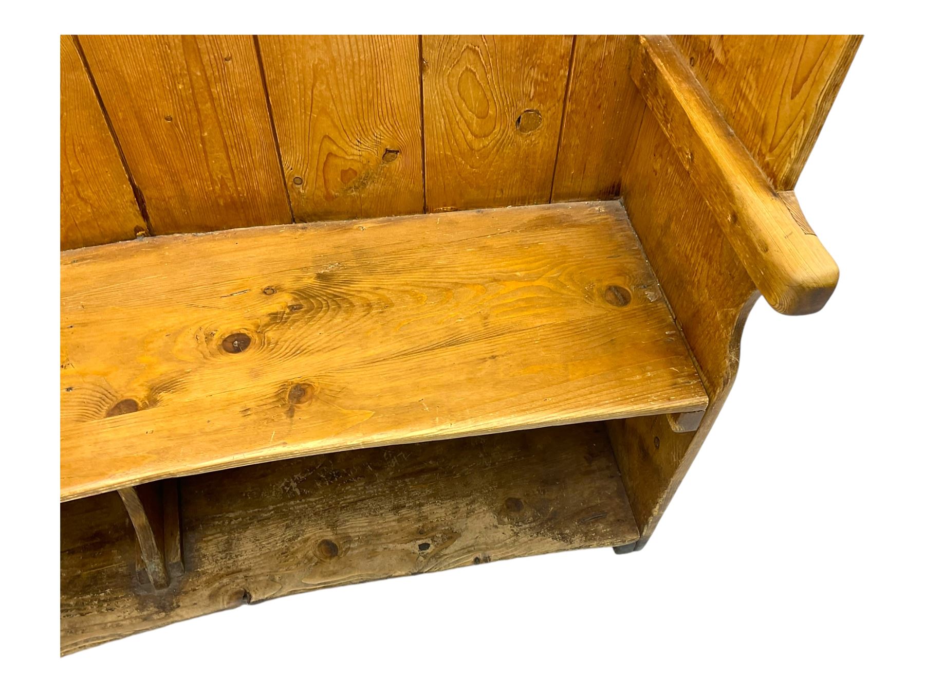 19th century pine barrel back settle, bowed boarded back on shaped end supports, with upholstered squab cushion 