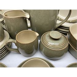 Denby tea and dinner wares, including bowls, jugs, tureens, side plates, dinner plates, serving dishes, cups and saucers, coffee pot, etc, all decorated with a green and brown mottled glaze, with printed marks beneath, in two boxes 