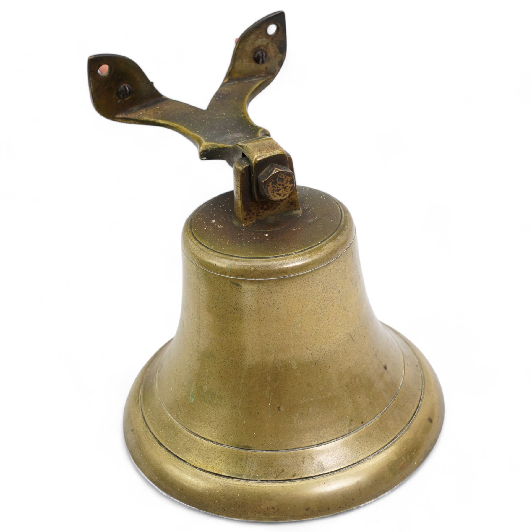 20th century brass bell with ornate split bracket, H20cm x bell D20cm